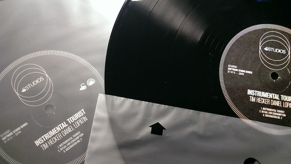 Tim Hecker, Daniel Lopatin - Instrumental Tourist Album Cover [Metaalprint]